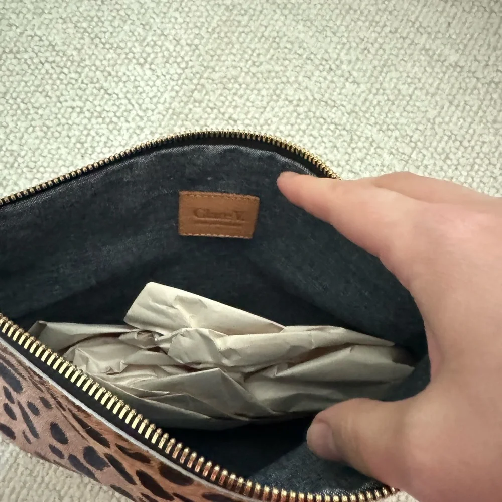 Clare V. Calf hair pouch, not fold over. Like new.